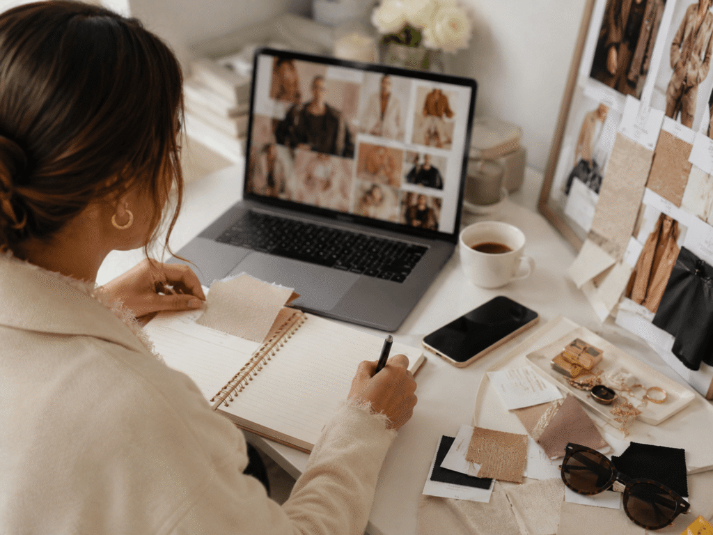 Woman creating a personal style inspiration board to choose her three style words.